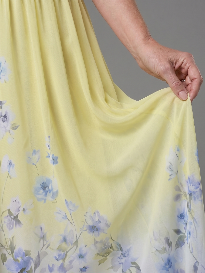 Auvelle | Robe midi sans manches à encolure en V avec ourlet floral doux