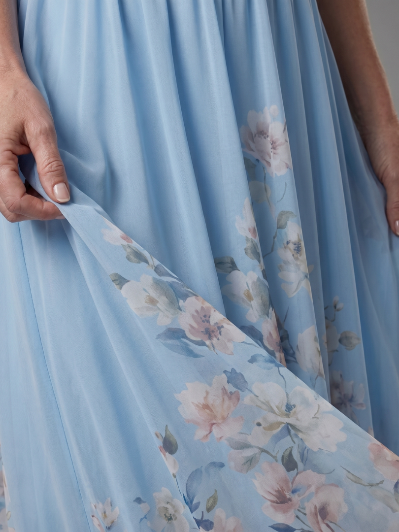 Auvelle | Robe midi sans manches à encolure en V avec ourlet floral doux